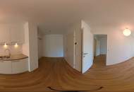 Moderne 2-Zimmer-Wohnung mit überdachtem Balkon und Grünblick