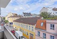 KOMPAKTE 2-ZIMMER WOHNUNG MIT NORD-GESIMSE UND BLUMENTRÖGEN