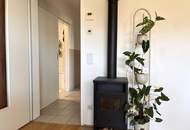 Erdgeschosswohnung mit Terrasse, Garten, PV und Kamin
