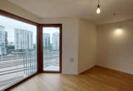 Sonnwendviertel: 1-Zimmer-Wohnung mit Balkon im 9. OG – Fitnessraum, Co-Working &amp; Rooftop-Terrasse inklusive!