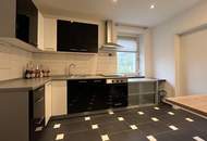 Moderne, sanierte 3-Zimmer-Eigentumswohnung mit Gartenanteil und Garage