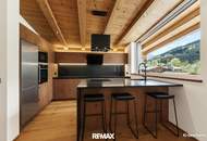 Mit dem Lift direkt in Ihr neues exklusives Penthouse mit Glaskamin und Traum Ausblick in Aurach bei Kitzbühel -