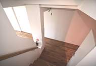 Hauptbahnhof und U1 Nähe - Erstbezug! Exklusive DG Wohnung mit Fernblick