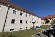 Herrlich sanierte Erdgeschosswohnung mit moderner Wohnküche, stilvollem Badezimmer und Grünblick - in ruhiger Siedlungslage mit ausgezeichneter Infrastruktur, ideal für kleine Familien!