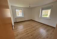 Die Natur vor der Haustüre: Ruhige Grünlage, ohne auf die Vorteile einer hervorragenden Infrastruktur verzichten zu müssen! Schnell sein und diese gemütliche Wohnung mit praktischer Raumaufteilung sichern!