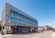 Grundstück mit vier Baukörpern - Büro-, Geschäfts- und Gewerbegebäude inkl. Parkplätzen in Vösendorf