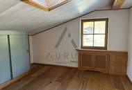 Miete: Dachgeschosswohnung mit Terrasse und Parkplätzen in Aurach