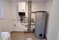 Neuwertige Doppelhaushälfte mit Carport und PV-Anlage in Reichersdorf