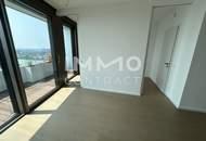 2 Zimmer Erstbezug mit atemberaubenden Blick auf die Donau! Pool, Sauna, Gym inklusive!