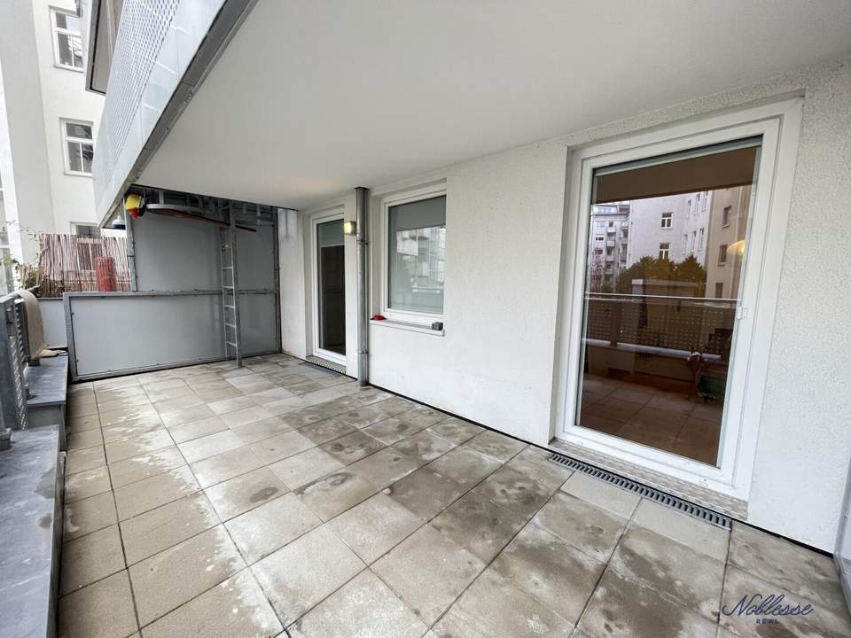 Große, hofseitige Terrasse! Zentral gelegene 2-Zimmer-Neubauwohnung!