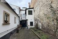 3-Zimmer-Dachgeschosswohnung mit Blick auf die Kirche – Top-Lage am Hauptplatz in Bruck an der Leitha