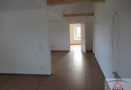 Wunderschöne neue Obergeschoss-Wohnung mit Eigengarten zu verkaufen!