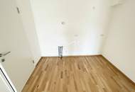 Lichtdurchfluteter Erstbezug: 3-Zimmer-Neubauwohnung mit Loggia und Weitblick