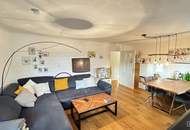 Mauer "Licht. Ruhe. Effizienz. Stilvolle Maisonette mit Südterrasse" | ZELLMANN IMMOBILIEN