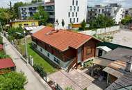 Chalet-Feeling mitten in Donaufeld - Naturstamm-Blockhaus mit Sauna, Kamin und Garten