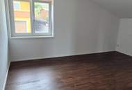 Sonnige 4 Zi-Dachgeschosswohnung mit Terrasse und Balkon!