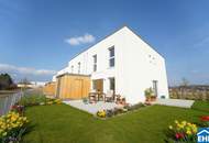 Familienglück im Grünen – nachhaltige Reihenhäuser am Kanal