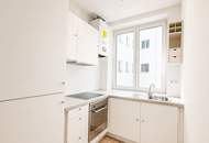 Teilrenovierungsbedürftige 2-Zimmer-Wohnung mit Balkon in urbaner Toplage