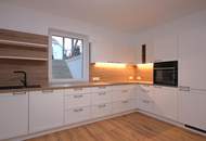 Erstbezug nach Sanierung: Schlüsselfertige Maisonette-Wohnung mit großzügigem Garten