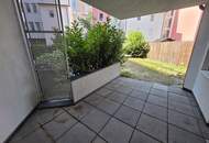 Barrierefreie Zweizimmerwohnung mit Eigengarten und Tiefgaragenstellplatz!